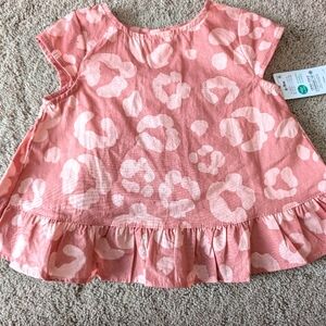 Pink 6-9 month top new with tag.